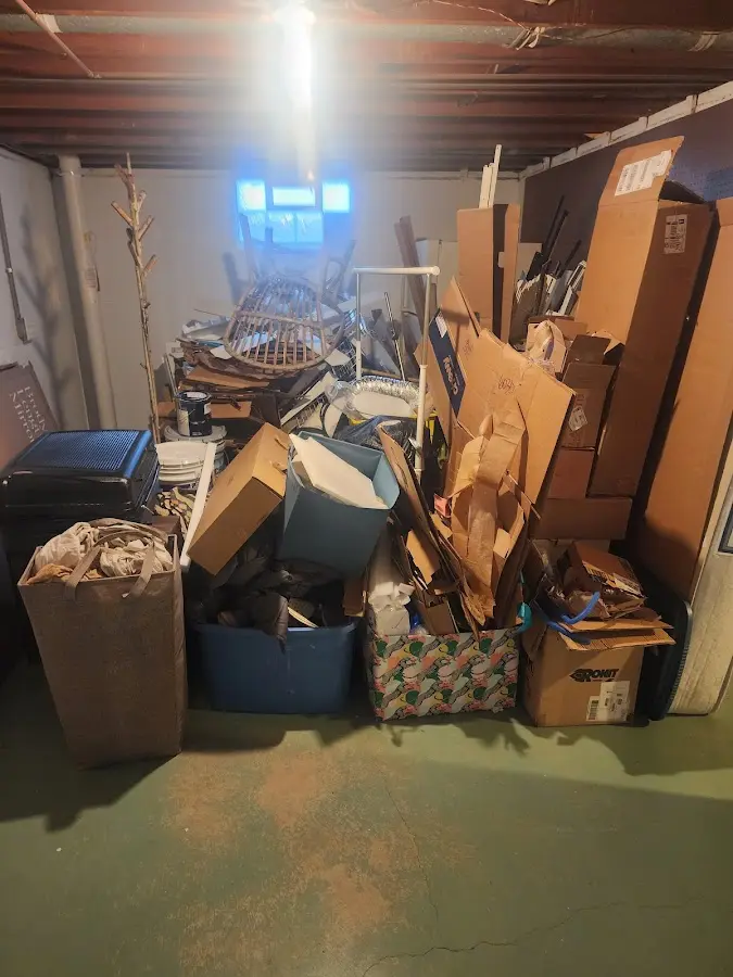 Roll-off dumpster container at job site for 2 Yard Dumpster Rental in Imlay